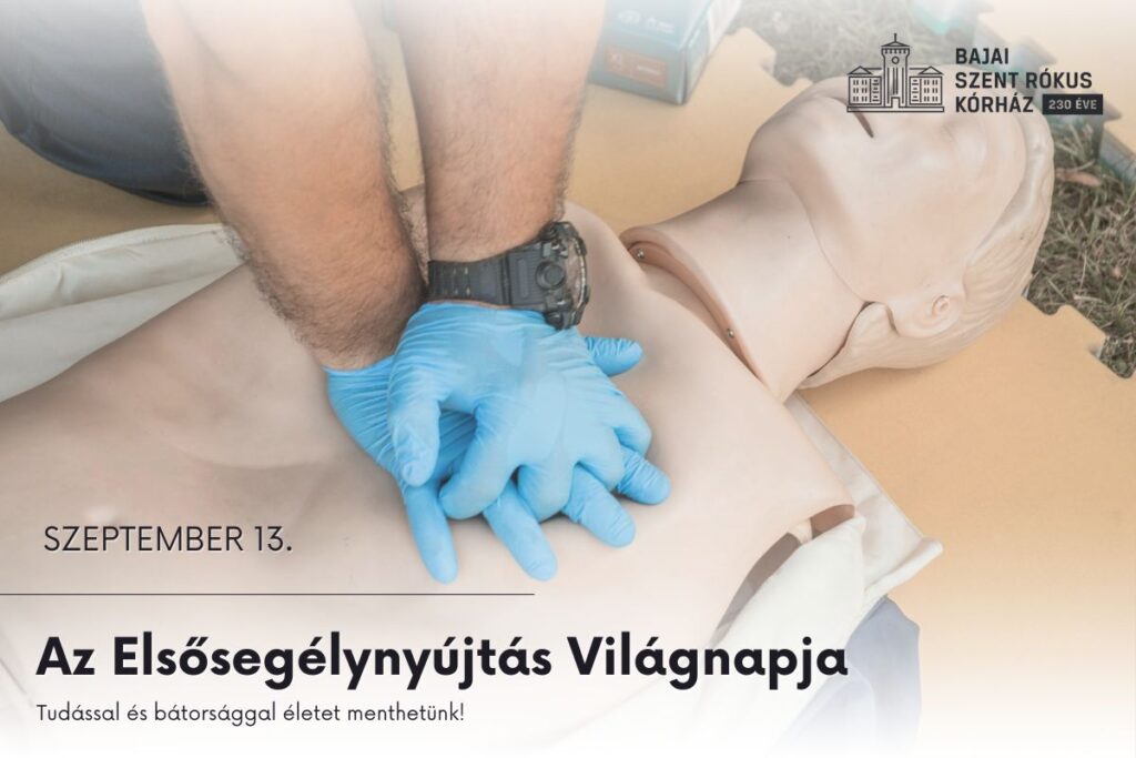 Elsősegélynyújtás Világnap. Egy ember mellkaskompressziót végez egy bábun.